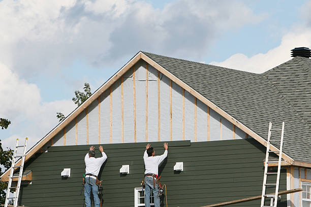 Professional Siding technician working in Austin, TX